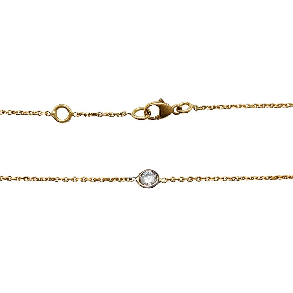 Gutter necklace in yellow and white gold and diamonds. - . Görsel