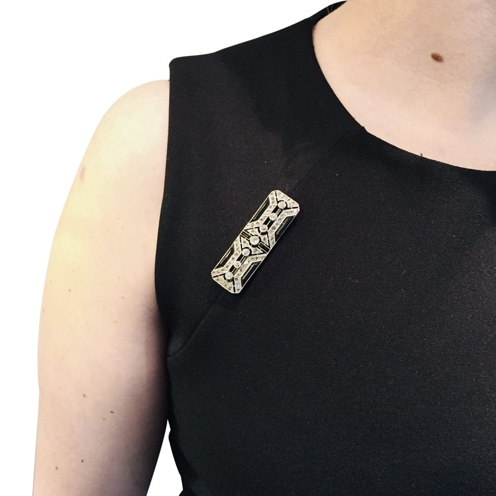 Pin Art Deco in platinum, diamonds and onyx. - . Görsel