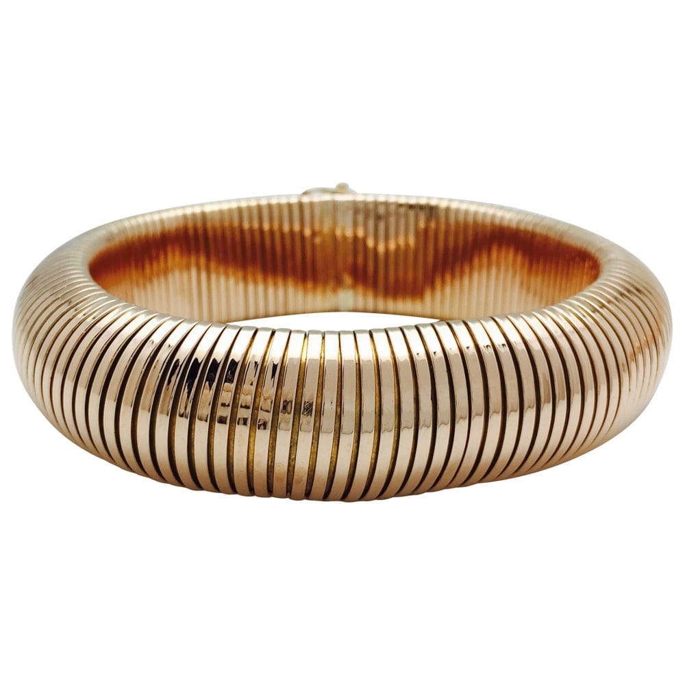 Spiro-Tube bracelet in yellow gold.