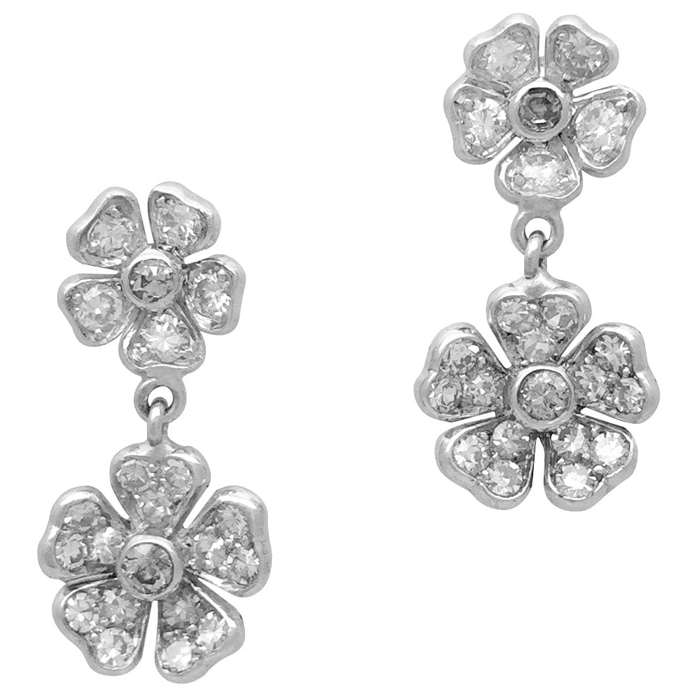 Pair of flower pattern dangling earrings in white gold, diamonds.