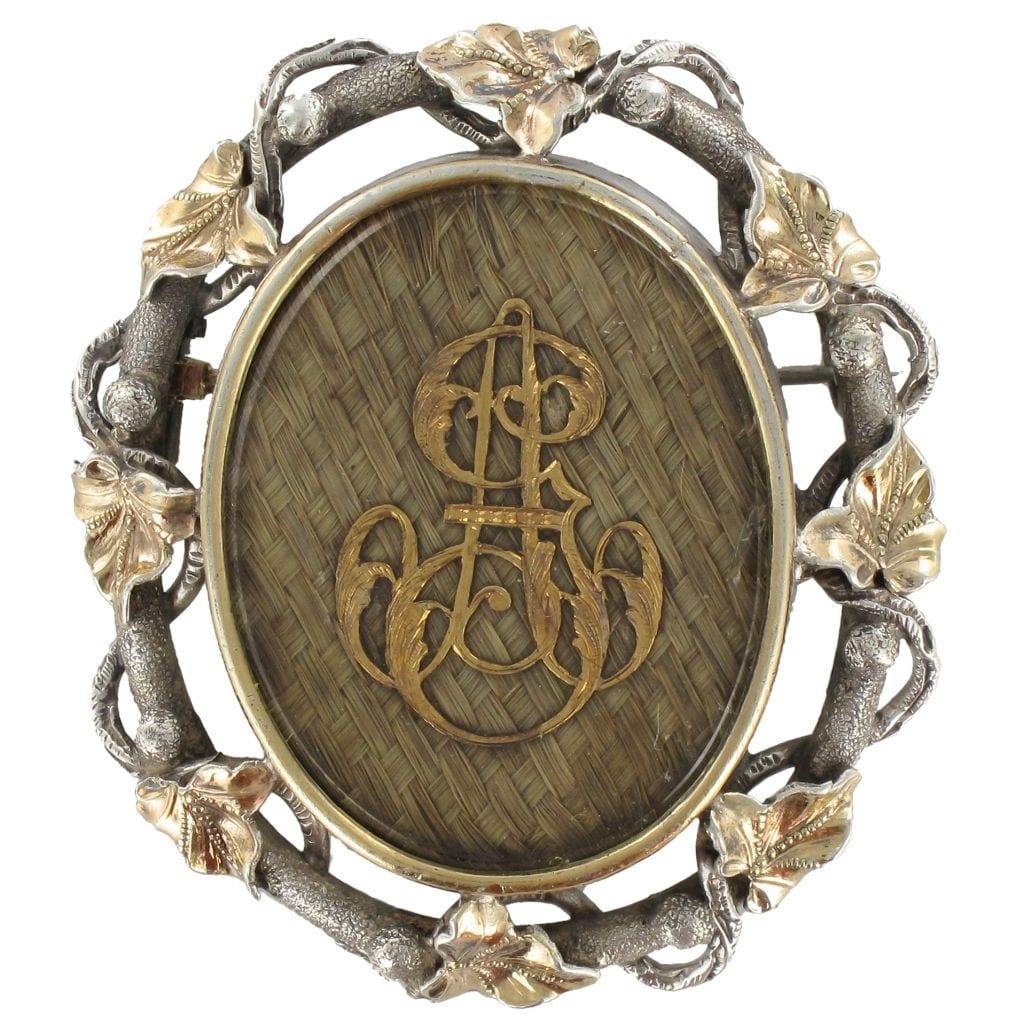 Old brooch silver souvenir hair