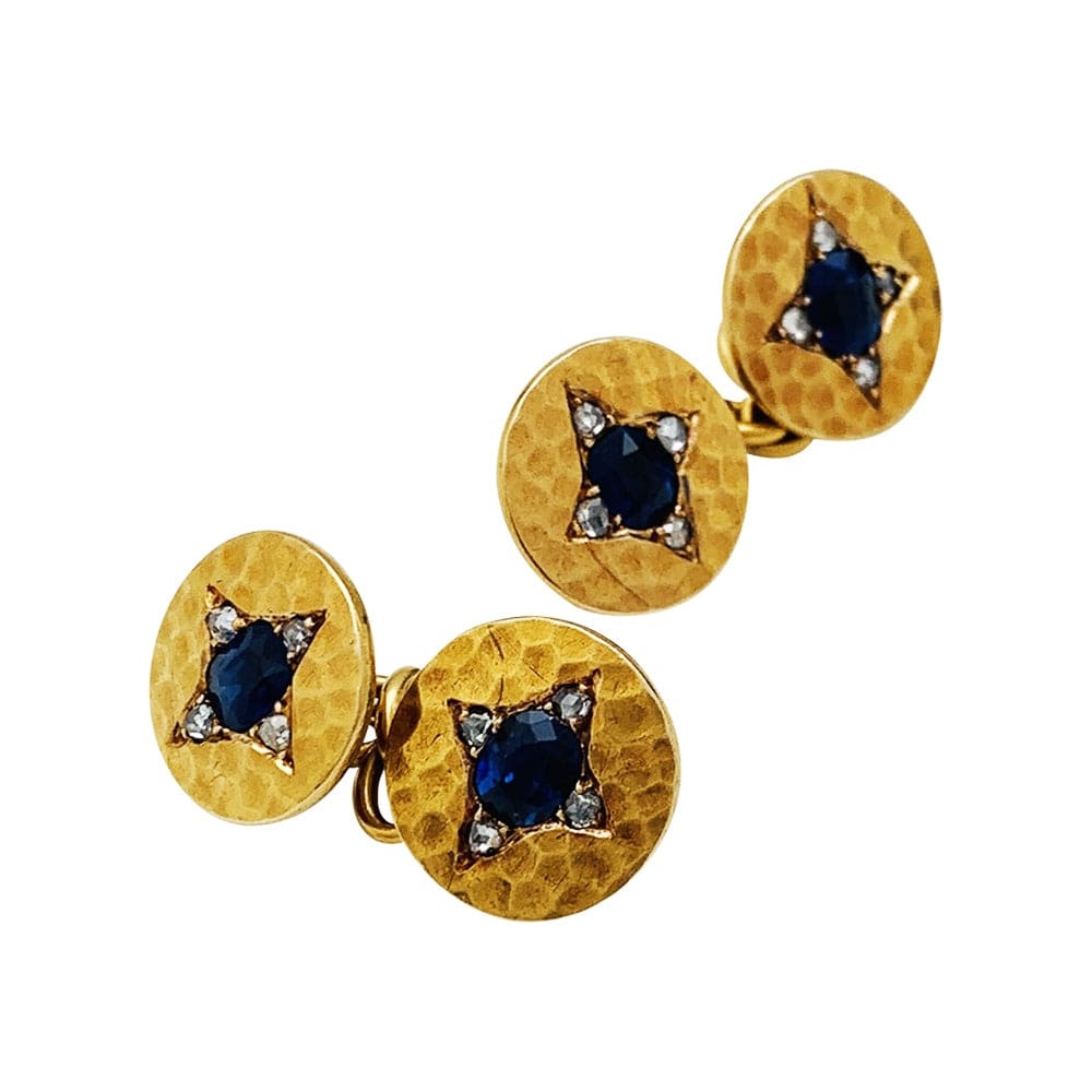Cufflinks in yellow gold, sapphires and diamonds.