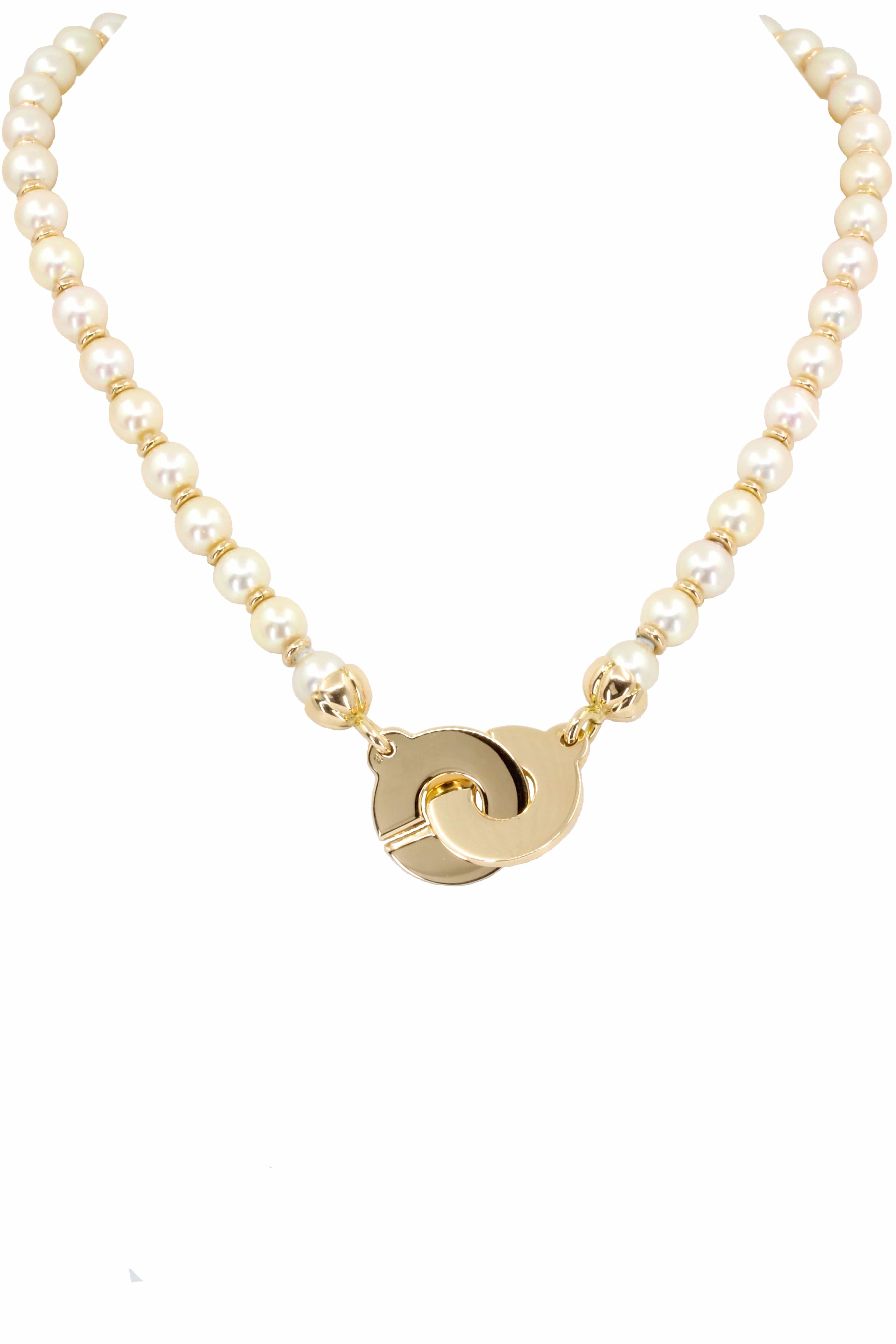 Pearl necklace with handcuff clasp