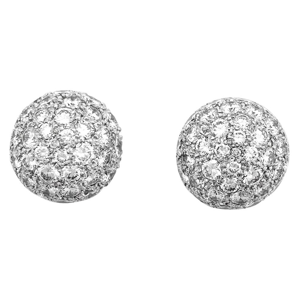 Half-sphere earrings in white gold and diamonds.