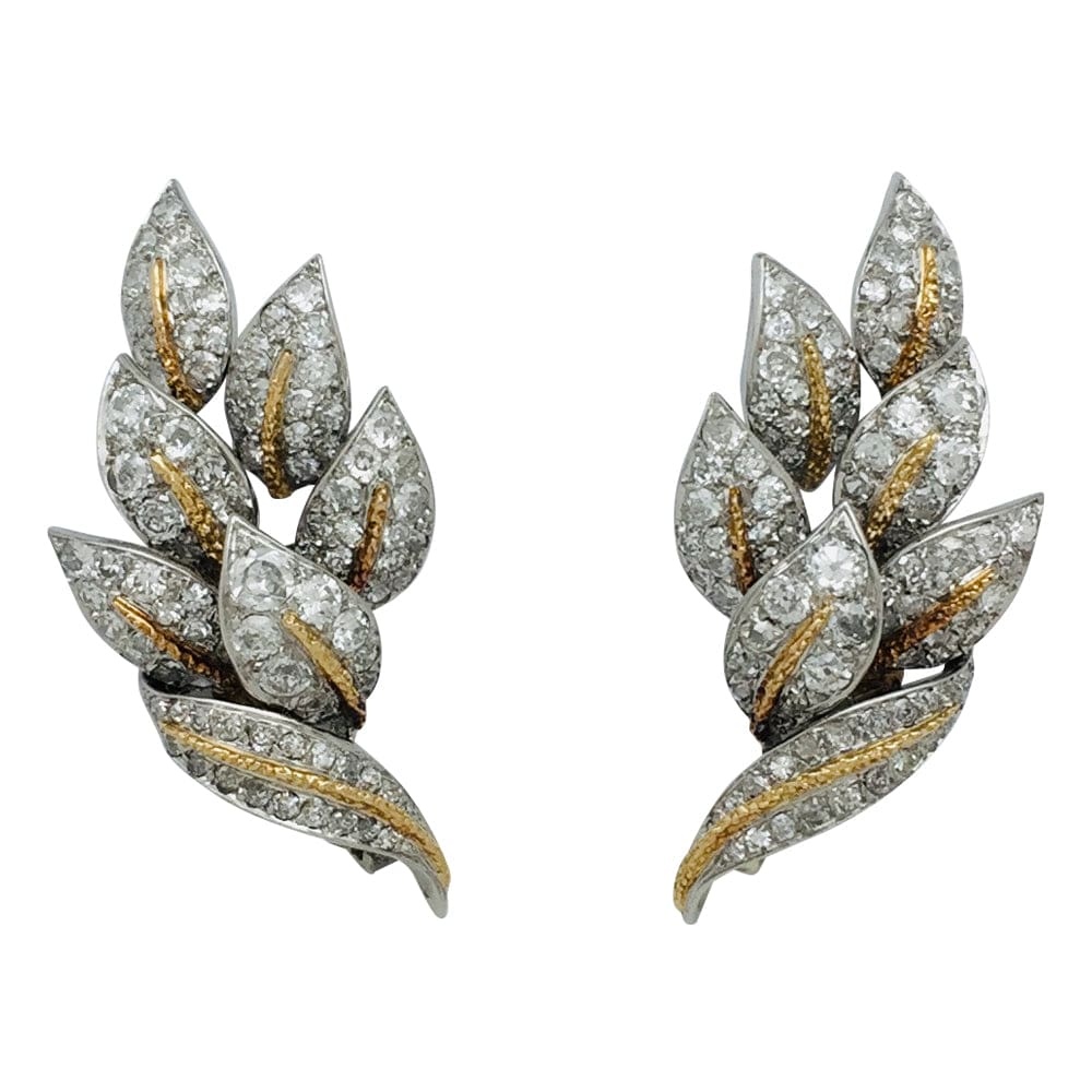 “Leaves” earrings in platinum yellow gold and diamonds.