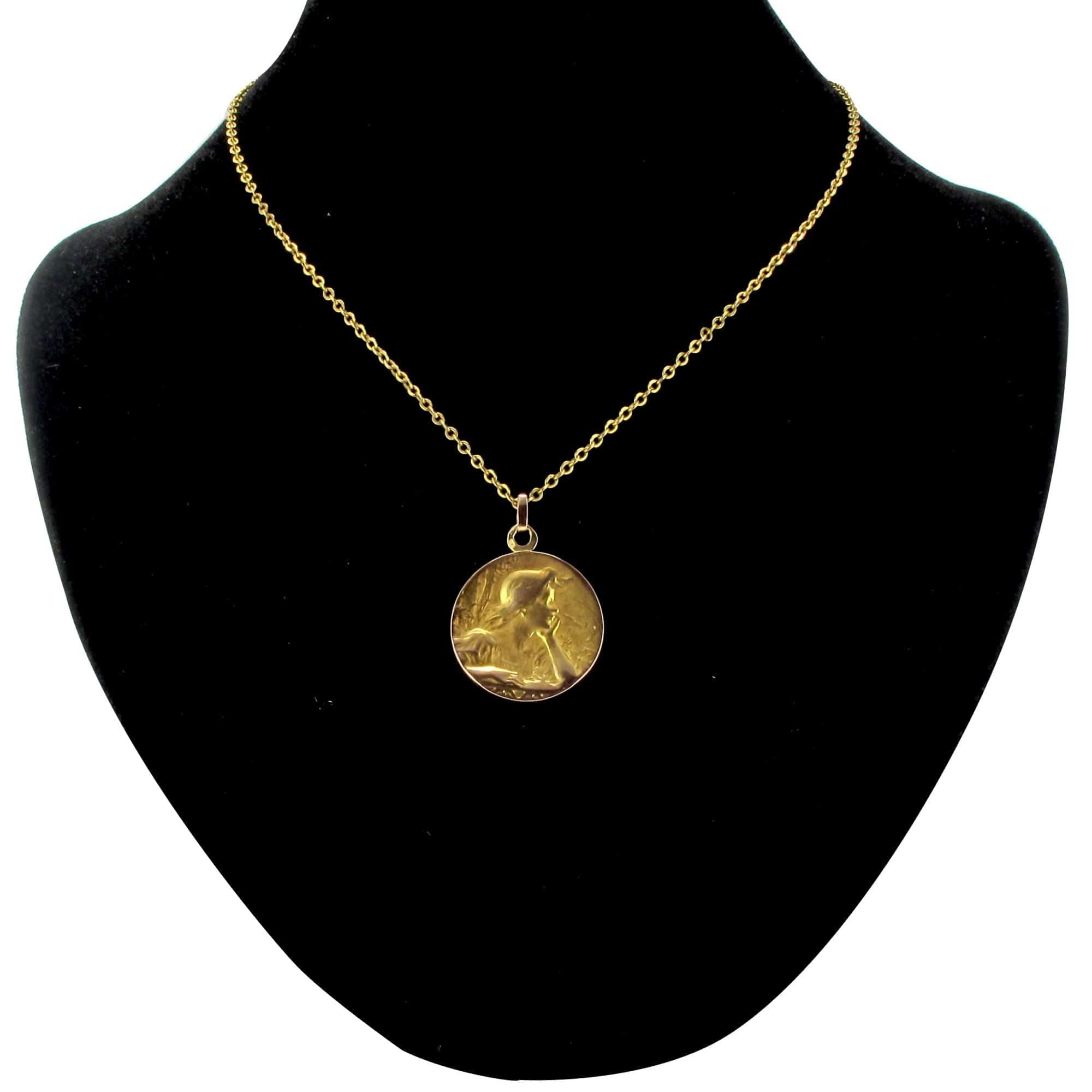 Old rose gold medal portrait of a woman - . Görsel