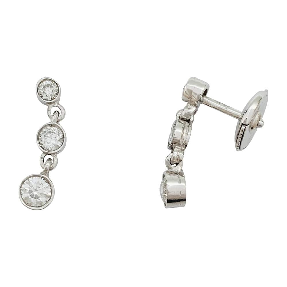 White gold and diamond dangling earrings. - . Görsel