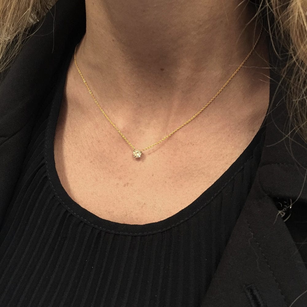 Diamond solitaire necklace 0.63 carat, 2 golds - . Görsel