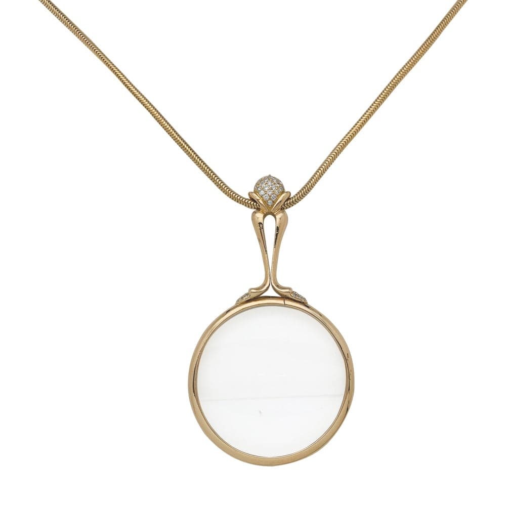 Yellow gold chain and magnifying glass, diamonds. - . Görsel